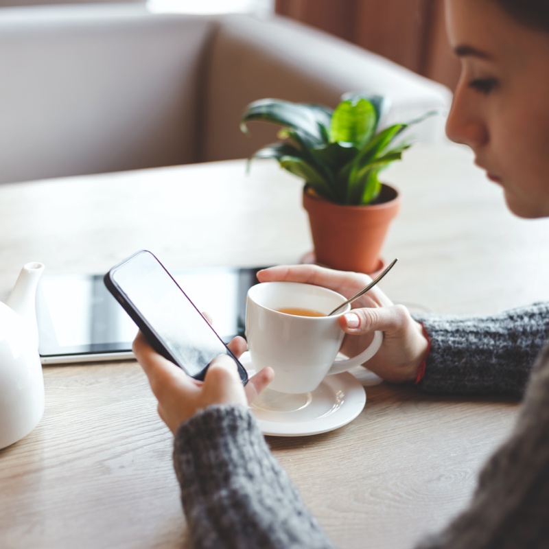 A female using restaurant application for food delivery